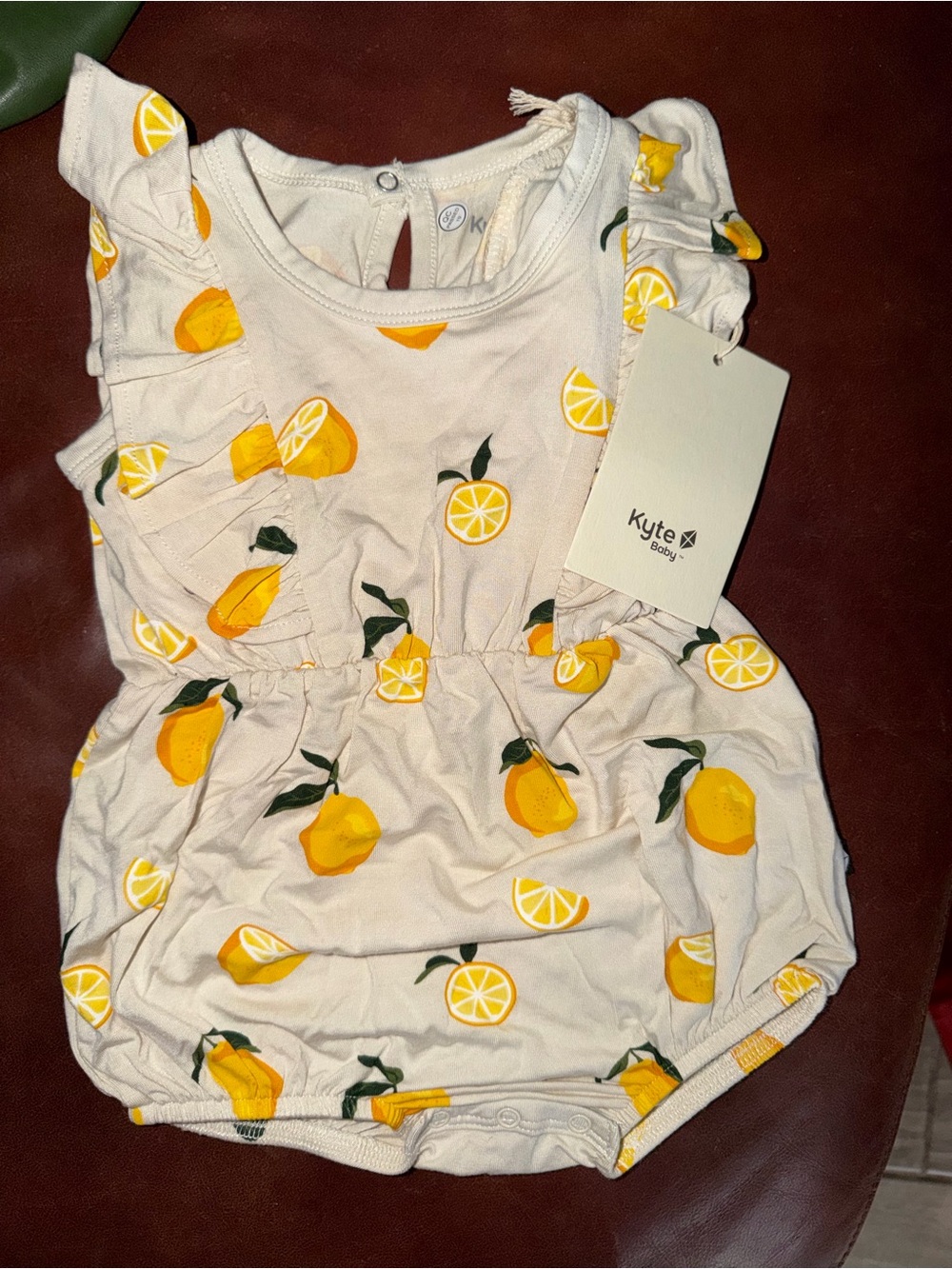 Kyte BABY Cream & Yellow Lemon Ruffle Baby Romper